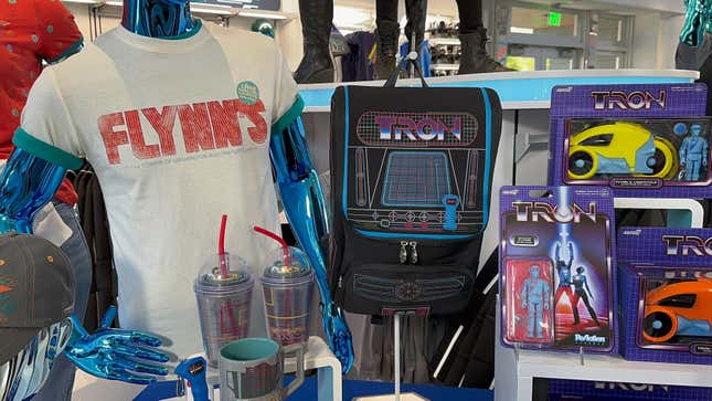 Image for article titled Tron Merch at Walt Disney World Offers Sci-Fi Fits, Retro Toys, and Custom Figures