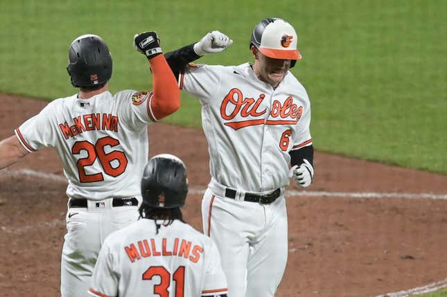 May 16, 2023; Baltimore, Maryland, USA;  Baltimore Orioles first baseman Ryan Mountcastle (6) celebrates with left fielder Ryan McKenna (26) after hitting a two run home run against the Los Angeles Angels at Oriole Park at Camden Yards.