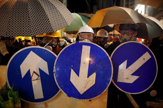 Protesters form a barricade on Jul. 28, 2019.