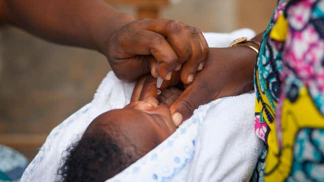 A child getting the oral polio vaccine at a health center in Lome, Togo.