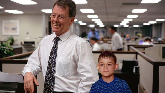 Aldrich shows his son the cubicle where he frequently retreats to sulk throughout the workday.
