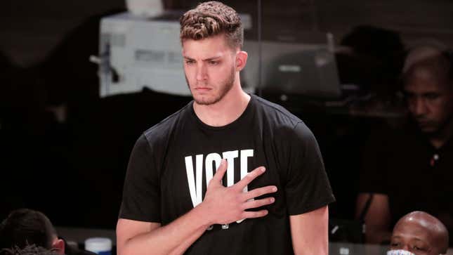 An image of Meyers Leonard with his right hand over his heart before the Miami Heat's game against the Los Angeles Lakers in October 2020.