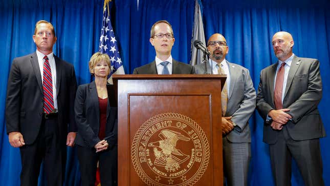 Benjamin Glassman (center), United States Attorney of the Southern District of Ohio, speaks during a news conference on July 18, 2019, in Cincinnati.