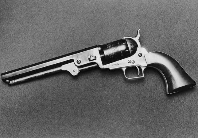 A replica model of an 1851 Colt Navy revolver with a squareback trigger guard, .36 caliber and 7.5 inch long barrel.