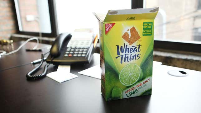 Image for article titled Dozens Wounded As Man Defends Box Of Wheat Thins From Invading Coworker Horde