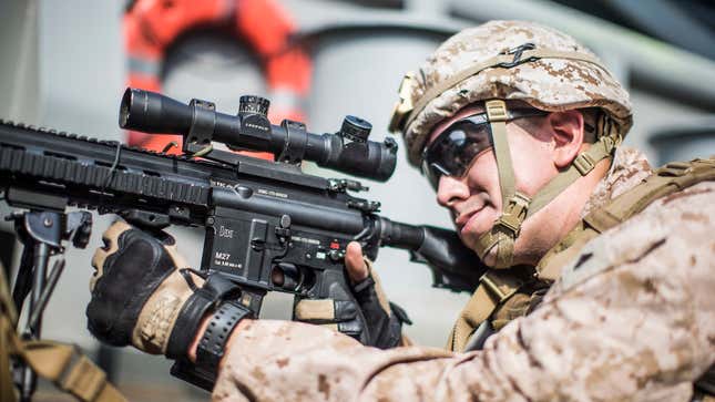 U.S. Marine Corps Corporal Isaiah Ledesma provides security with an M27 rifle aboard the USS Boxer on July 18, 2019 in a photo released by the U.S. military