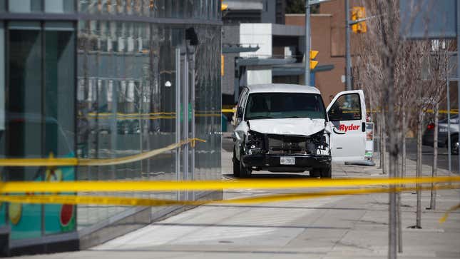 Police inspect the van used by alleged killer Alek Minassian in an incel attack in Toronto, Canada on April 23, 2018.