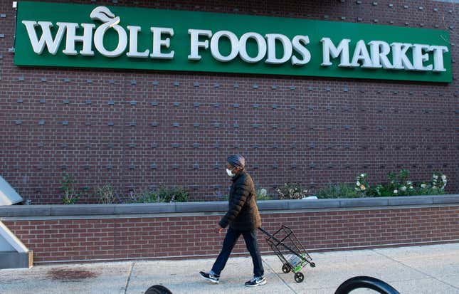 Image for article titled Whole Foods Sued by Employees Over Black Lives Matter Masks
