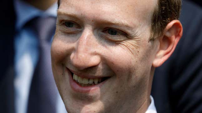 Facebook’s CEO Mark Zuckerberg smiles during a picture with guests attending the “Tech for Good” Summit at the Elysee Palace in Paris in May of 2018.