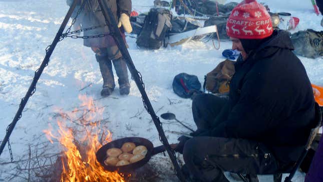 Image for article titled Doughnuts make everything better, especially when they’re cooked over a campfire