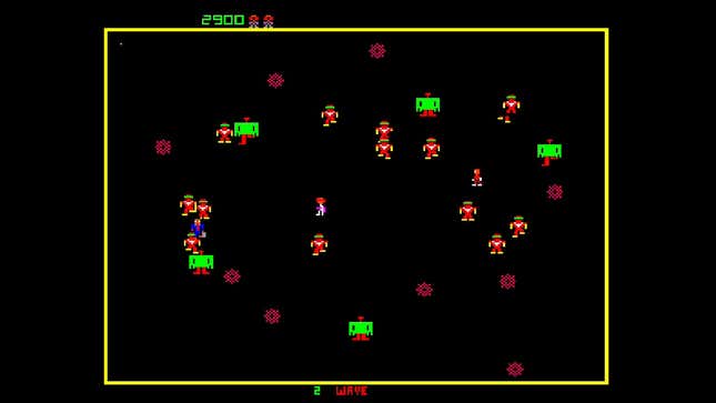 A screenshot of Robotron: 2084 in action, with little pixel robots everywhere.
