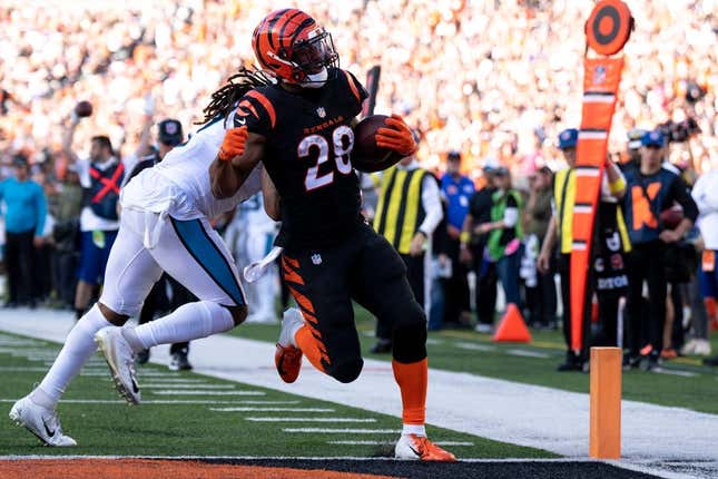 Cincinnati Bengals running back Joe Mixon (28) scores his fifth touchdown as Carolina Panthers linebacker Shaq Thompson (7) attempts to stop him in the third quarter during a Week 9 NFL game, Sunday, Nov. 6, 2022, at Paycor Stadium in Cincinnati. Cincinnati Bengals running back Joe Mixon (28) scored a franchise record five touchdowns in the game.

Nfl Carolina Panthers At Cincinnati Bengals