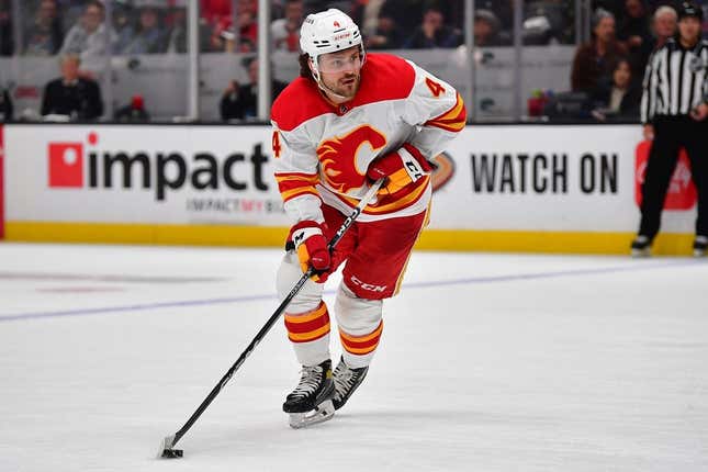 Mar 21, 2023; Anaheim, California, USA; Calgary Flames defenseman Rasmus Andersson (4) moves the puck against the Anaheim Ducks during the third period at Honda Center.