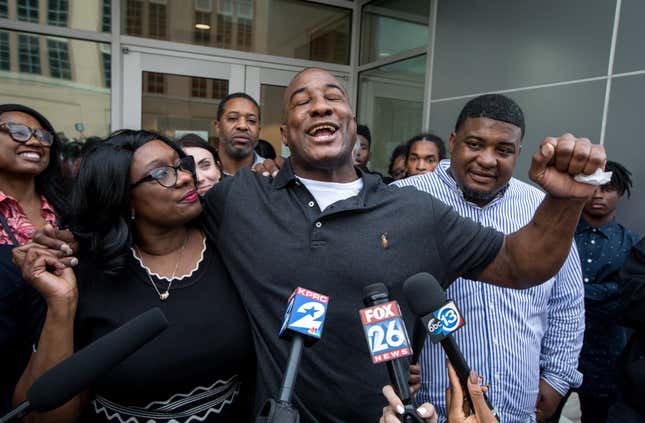 In this Nov. 26, 2019, file photo, Lydell Grant, center, his mother, Donna Poe, center-left, and brother Alonzo Poe, center-right, talk to reporters after Grant’s release on bond in Houston after new evidence cleared him in a 2010 fatal stabbing. The Texas Court of Criminal Appeals has declared him innocent of his crime. 