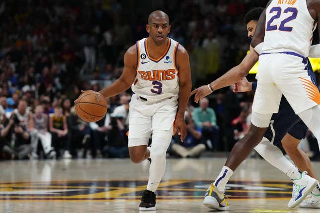 May 1, 2023; Denver, Colorado, USA; Phoenix Suns guard Chris Paul (3) controls the ball in the first quarter against the Denver Nuggets during game two of the 2023 NBA playoffs at Ball Arena.