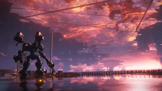 A mech looks out over a pink sunset. 