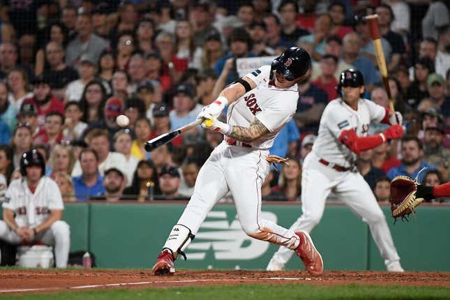 May 12, 2023; Boston, Massachusetts, USA; Boston Red Sox center fielder Jarren Duran (16) hits a two-RBI single during the fourth inning against the St. Louis Cardinals at Fenway Park.