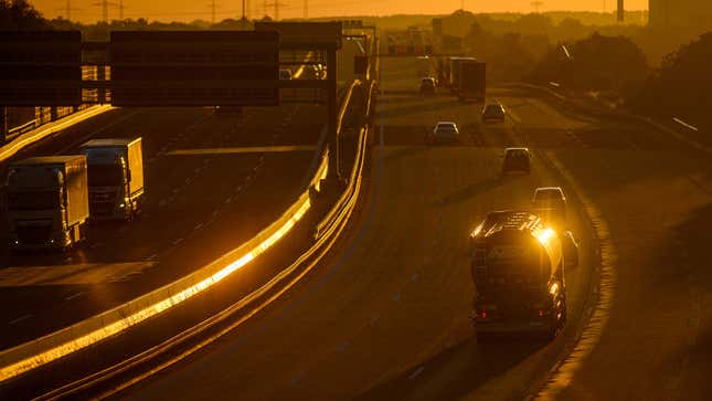 A photo of a US highway at sunrise. 