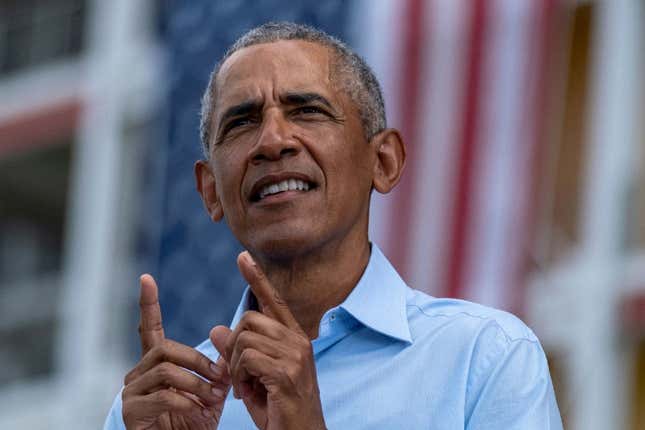 Former US President Barack Obama speaks at a Biden-Harris drive-in rally in Orlando, Florida on October 27, 2020.
