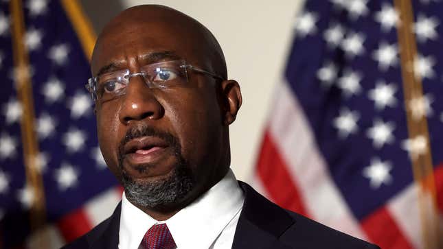Image for article titled Raphael Warnock Loses All Faith In God After Being Forced Into Runoff Against Herschel Walker