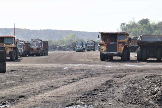 Trucks that were meant to transport coal to a nearby railway station stationed in a coal mine at Bermo in Jharkhand.