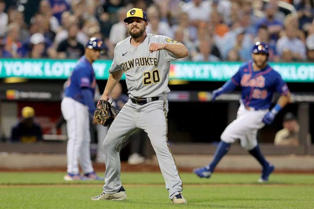 Jun 28, 2023; New York City, NY, USA; Milwaukee Brewers starting pitcher Wade Miley (20) after inducing a late inning double in the fourth inning against the New York Mets at Citi Field React.