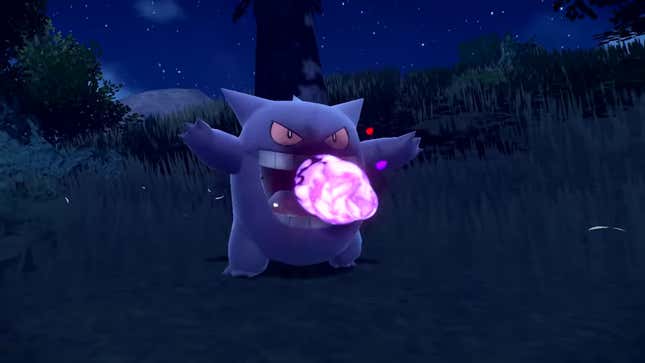 Gengar summons an energy ball at night in Pokemon Scarlet and Violet.