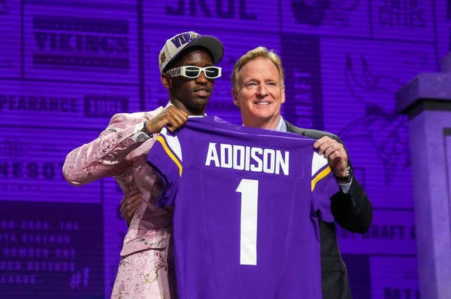 Apr 27, 2023; Kansas City, MO, USA; USC wide receiver Jordan Addison with NFL commissioner Roger Goodell after being selected by the Minnesota Vikings twenty third overall in the first round of the 2023 NFL Draft at Union Station.