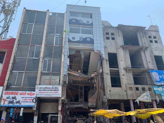 The facade of Lazeez Hotel, owned by Alim Shaikh’s family, was demolished, but the building next to it was spared.
