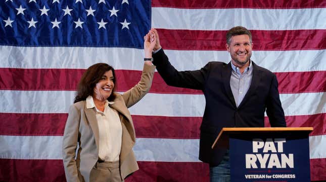 Democratic candidate Pat Ryan, right, and New York Gov. Kathy Hochul appear on stage together during a campaign rally for Ryan, Monday, Aug. 22, 2022, in Kingston, N.Y.