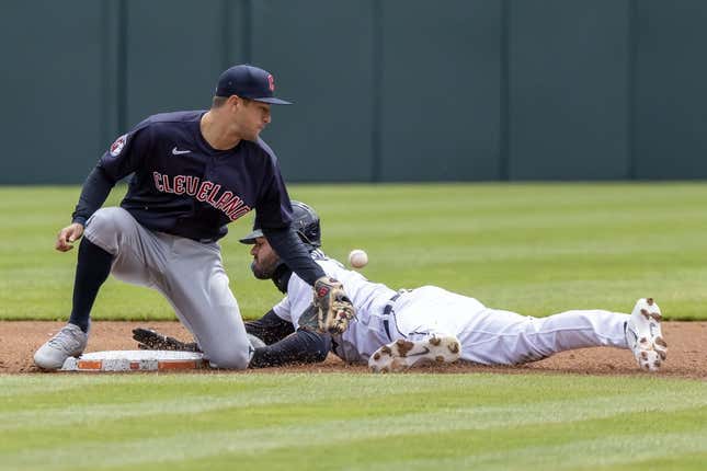 Apr 18, 2023; Detroit, Michigan, USA; Detroit Tigers center fielder Riley Greene (31) steals second base and beats the throw to Cleveland Guardians shortstop Tyler Freeman (2) at Comerica Park.