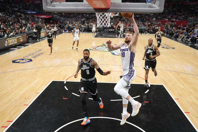 Feb 24, 2023; Los Angeles, California, USA; Sacramento Kings forward Domantas Sabonis (10) shoots the ball against the LA Clippers in the second half at Crypto.com Arena. The Kings defeated the Clippers 176-175 in double overtime.