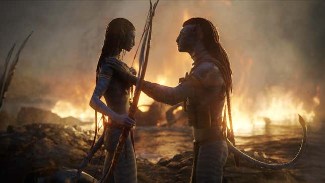 (L-R)- Neytiri (Zoe Saldana) and Jake Sully (Sam Worthington) in 20th Century Studios' AVATAR- THE WAY OF WATER