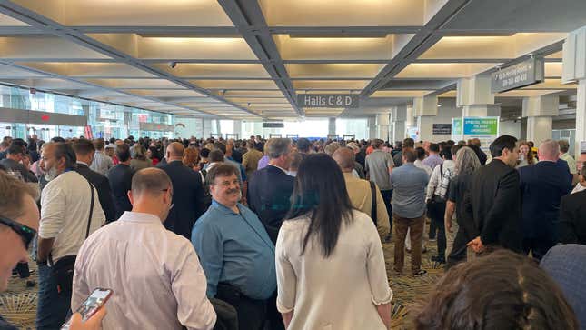 The biggest crowd at the 2022 North American International Auto Show — waiting to get through Secret Service security on Wednesday to enter the convention center while President Biden was in the building.