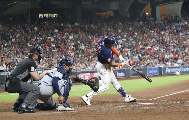 Oct 2, 2022; Houston, Texas, USA;  Houston Astros shortstop Jeremy Pena (3) hits a RBI single against the Tampa Bay Rays in the seventh inning at Minute Maid Park.