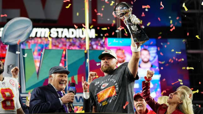 Image for article titled Parade Pat returns, Travis Kelce shoots Fireball, and more from the Kansas City parade