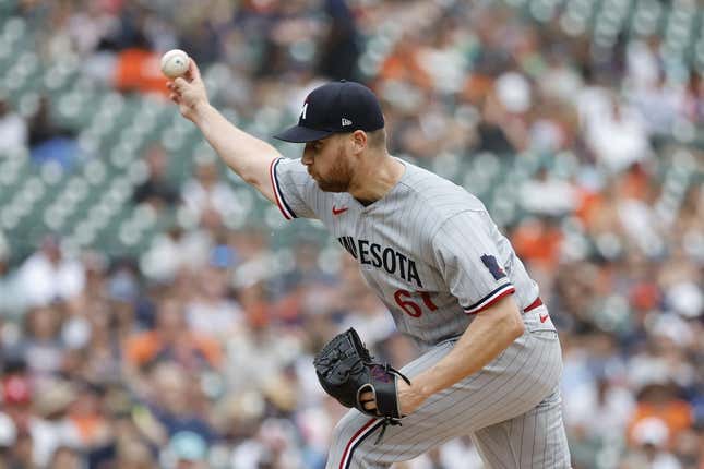 Jun 25, 2023; Detroit, Michigan, USA; Minnesota Twins relief pitcher Brock Stewart (61) pitches in the eighth inning against the Detroit Tigers at Comerica Park.