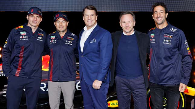 A photo of Ford CEO Jim Farley with the Red Bull Formula 1 team. 