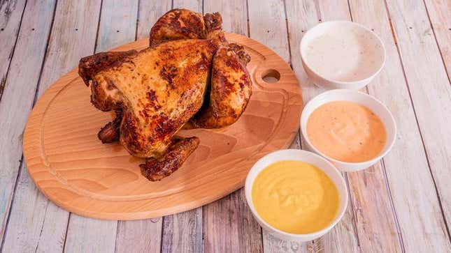 Rotisserie chicken with three dipping sauces