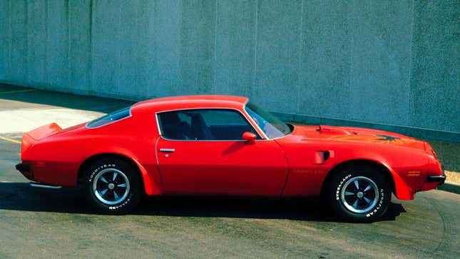 A side profile photo of a Pontiac Firebird muscle car 