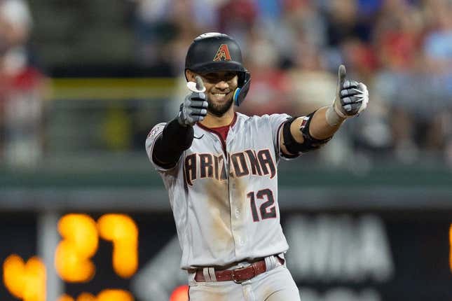 May 22, 2023; Philadelphia, Pennsylvania, USA; Arizona Diamondbacks left fielder Lourdes Gurriel Jr. (12) reacts after his RBI double during the eighth inning against the Philadelphia Phillies at Citizens Bank Park.