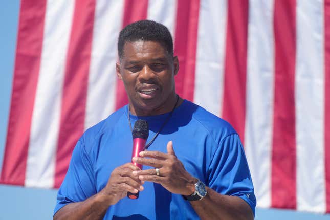Georgia GOP Senate nominee Herschel Walker smiles during remarks during a campaign stop at Battle Lumber Co. on Thursday, Oct. 6, 2022, in Wadley, Ga. Walker’s appearance was his first following reports that a woman who said Walker paid for her 2009 abortion is actually mother of one of his children - undercutting Walker’s claims he didn’t know who she was.