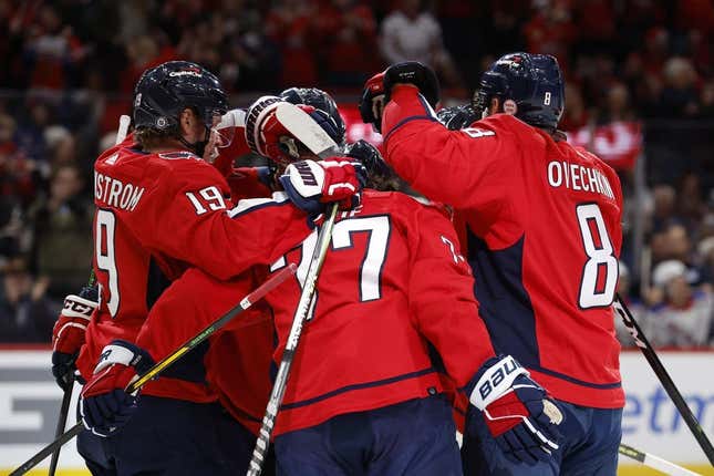 Feb 25, 2023; Washington, District of Columbia, USA; Washington Capitals right wing T.J. Oshie (77) celebrates with teammates after scoring a goal against the New York Rangers in the first period at Capital One Arena.
