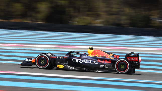 A photo of a Red Bull F1 car driving at the French Grand Prix. 
