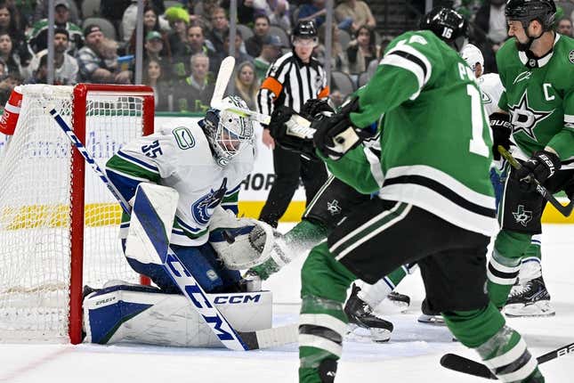 Feb 27, 2023; Dallas, Texas, USA; Vancouver Canucks goaltender Thatcher Demko (35) stops a shot by Dallas Stars center Joe Pavelski (16) during the second period at the American Airlines Center.