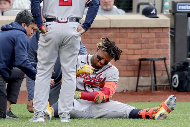 May 1, 2023; New York City, New York, USA; Atlanta Braves right fielder Ronald Acuna Jr. (13) reacts after being hit by a pitch during the first inning against the New York Mets at Citi Field. Acuna left the game for a pinch runner.