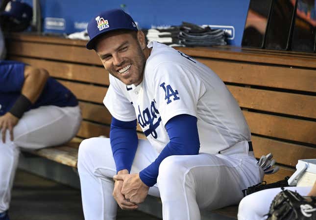 Jun 16, 2023; Los Angeles, California, USA;   Los Angeles Dodgers first baseman Freddie Freeman (5) laughs in the dugout prior to the game against the San Francisco Giants at Dodger Stadium.