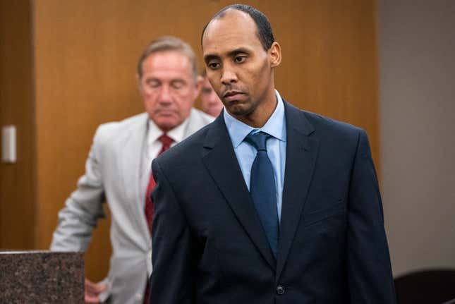 In this June 7, 2019 file photo, former Minneapolis police officer Mohamed Noor walks to the podium to be sentenced at Hennepin County District Court in Minneapolis. The Minnesota Supreme Court on Wednesday, Sept. 15, 2021, reversed the third-degree murder conviction of Noor, who fatally shot an Australian woman in 2017, saying the charge doesn’t fit the circumstances in this case. 