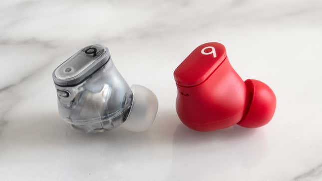 A single Beats Studio Buds + earbud next to a single Beats Studio Buds earbud.