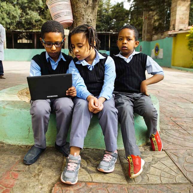 School children learn to count with YaNetu, and AI-driven teaching tablet.